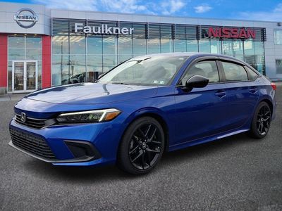 2024 Honda Civic Sedan — rear three-quarter view
