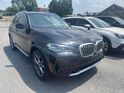2024 BMW X3 xDrive30i — rear three-quarter view