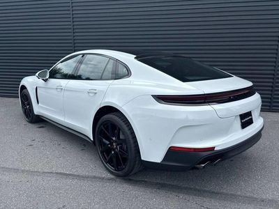 2024 Porsche Panamera — rear three-quarter view