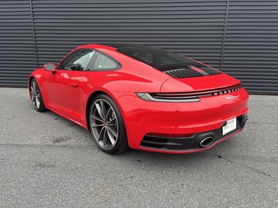 2024 Porsche 911 — rear three-quarter view