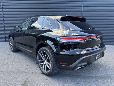 2025 Porsche Macan — rear three-quarter view