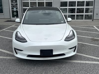 2023 Tesla Model 3 — side profile view