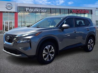 2023 Nissan Rogue — rear three-quarter view