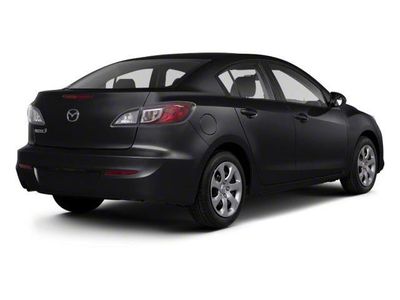 2013 Mazda Mazda3 — rear three-quarter view