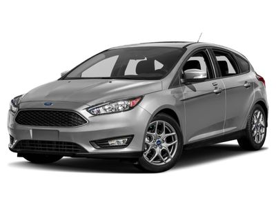 2015 Ford Focus SE in Ingot Silver — front three-quarter view