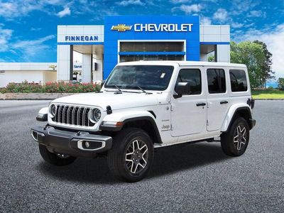 2024 Jeep Wrangler — rear three-quarter view
