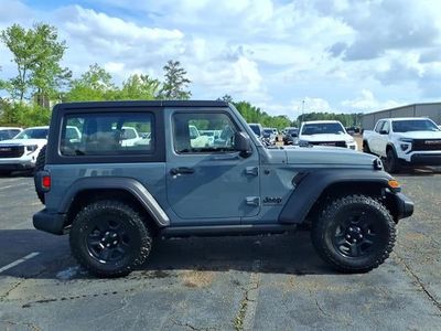 2024 Jeep Wrangler — rear three-quarter view
