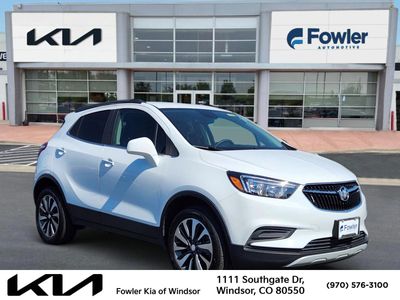 2021 Buick Encore Preferred AWD in Summit White — front three-quarter view