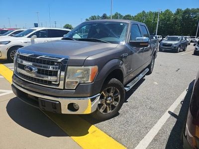 2013 Ford F-150 — rear three-quarter view