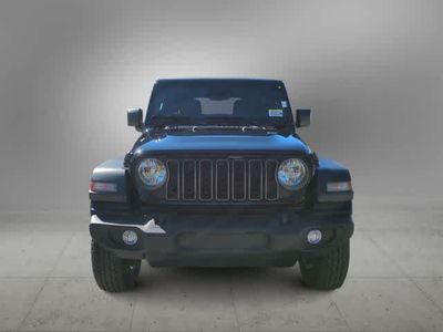 2026 Jeep Wrangler — rear three-quarter view