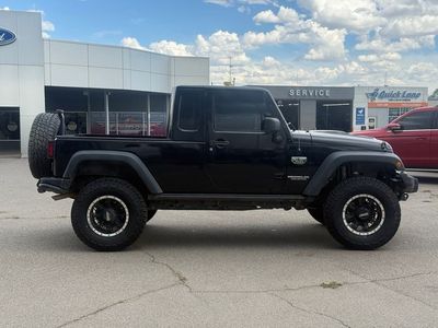 2012 Jeep Wrangler — rear three-quarter view