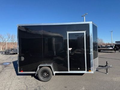 26 CROSS ENCLOSED CARGO — rear three-quarter view