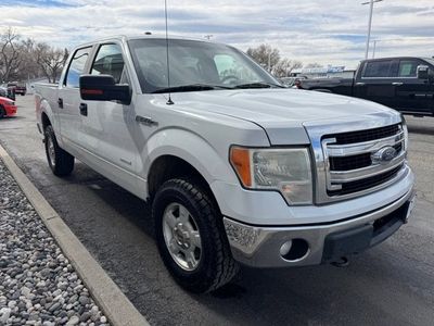 2013 Ford F-150 — rear three-quarter view