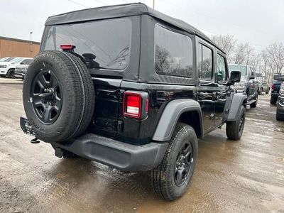 2025 Jeep Wrangler — rear three-quarter view