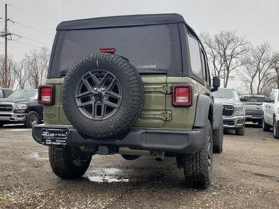 2025 Jeep Wrangler — rear three-quarter view