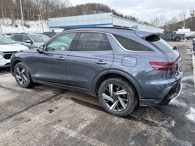 2026 Genesis GV70 — rear three-quarter view
