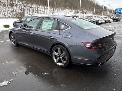 2026 Genesis G80 — rear three-quarter view
