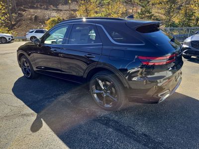 2026 Genesis GV70 — rear three-quarter view