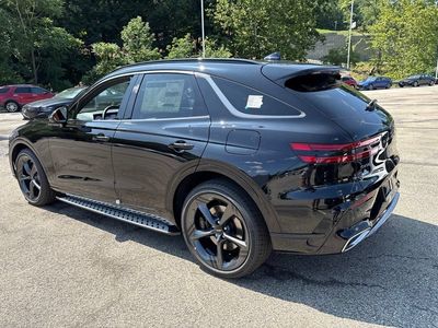 2026 Genesis GV70 — rear three-quarter view