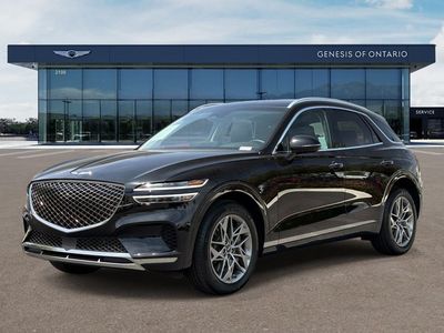 2024 Genesis GV70 — rear three-quarter view