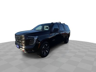 2025 GMC Yukon XL — rear three-quarter view