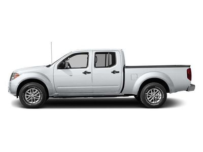 2014 Nissan Frontier — rear three-quarter view
