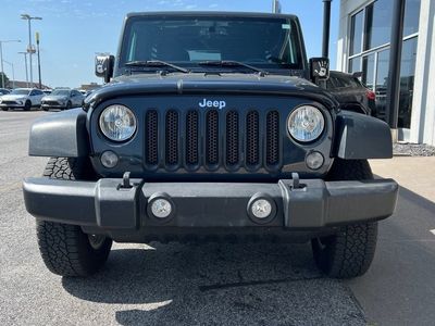 2016 Jeep Wrangler Unlimited — rear three-quarter view