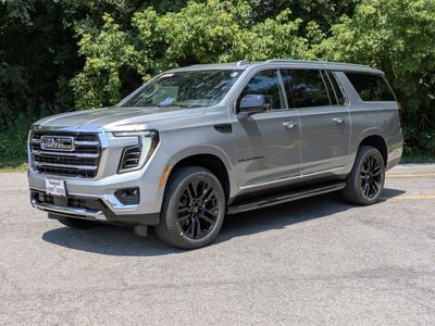 2026 GMC Yukon XL — rear three-quarter view