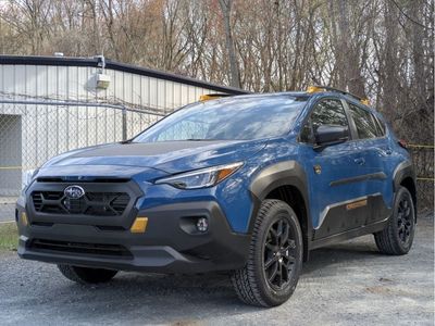 2026 Subaru CROSSTREK — rear three-quarter view