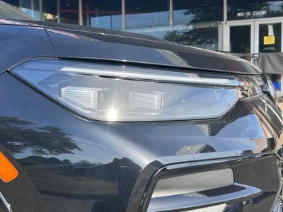 2026 Volkswagen Tiguan — rear three-quarter view
