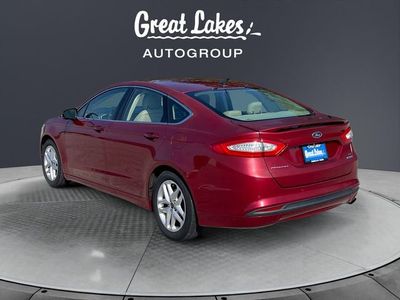 2014 Ford Fusion — rear three-quarter view
