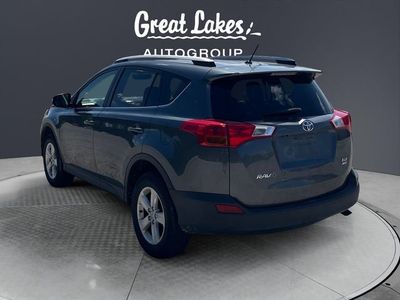 2013 Toyota RAV4 — rear three-quarter view