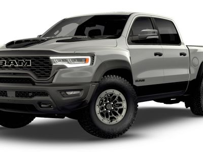 2026 RAM 1500 RAM 1500 RHO CREW CAB 4X4 5'7' BOX in Silver Zynith Exterior Paint — front three-quarter view