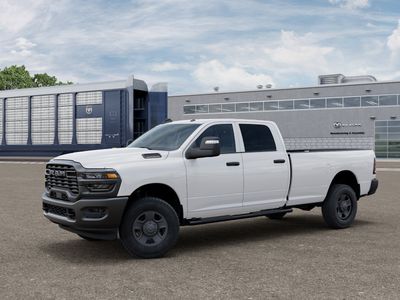 2026 RAM 2500 RAM 2500 TRADESMAN CREW CAB 4X4 8' BOX in Bright White Clear-Coat Exterior Paint — front three-quarter view