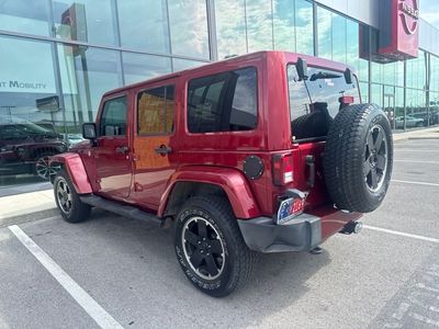 2012 Jeep Wrangler — rear three-quarter view