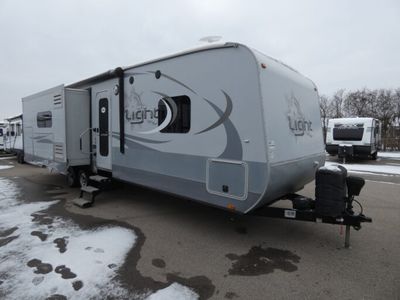 2015 HIGHLAND RIDGE 272RLS — front three-quarter view
