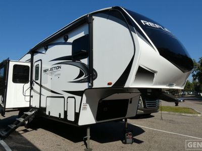 2021 GRAND DESIGN 303RLS — front three-quarter view