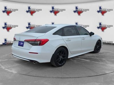 2023 Honda Civic Sedan — rear three-quarter view