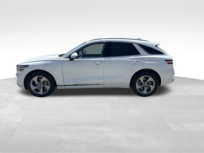 2026 Genesis GV70 — rear three-quarter view