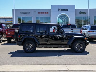 2026 Jeep Wrangler — rear three-quarter view