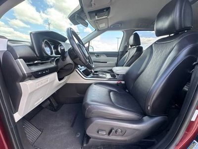 2023 Kia Carnival — side profile view