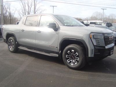 2026 GMC Sierra EV — rear three-quarter view