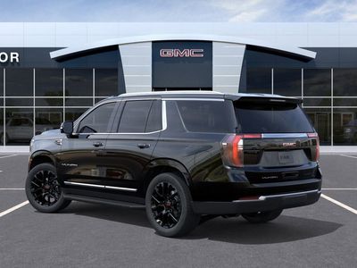 2026 GMC Yukon — rear three-quarter view