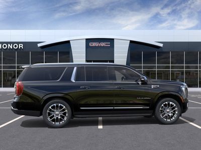 2026 GMC Yukon XL — rear three-quarter view