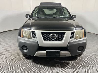2011 Nissan Xterra — rear three-quarter view
