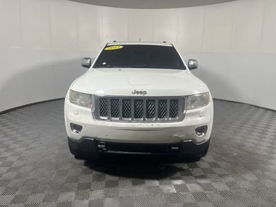 2013 Jeep Grand Cherokee — rear three-quarter view