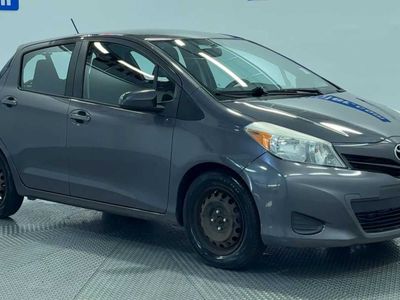 2014 Toyota Yaris — side profile view