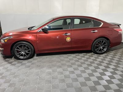 2013 Nissan Altima — rear three-quarter view