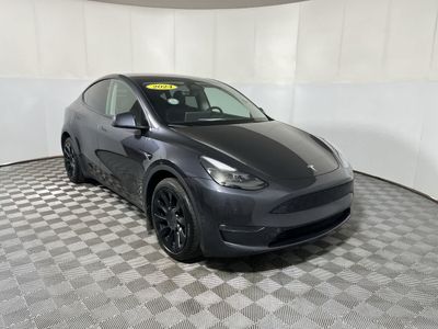 2024 Tesla Model Y — side profile view