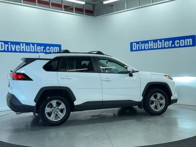 2025 Toyota RAV4 — rear three-quarter view